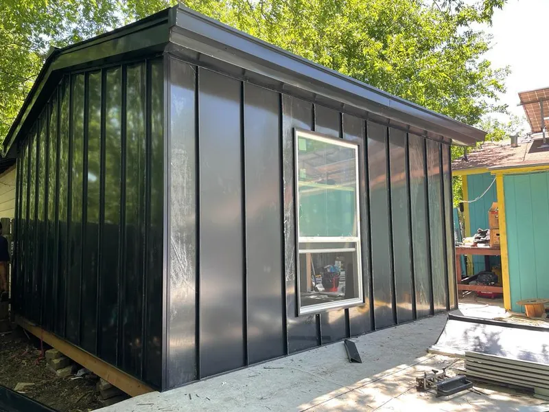 Black standing seam metal wall panels for Roof Inspection in Tamiami